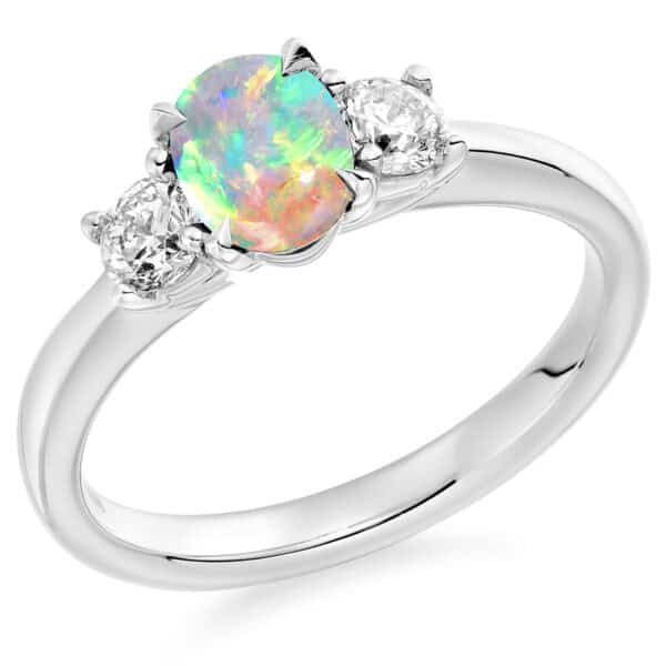 Opal and Diamond Oval Cut Trilogy Engagement Ring
