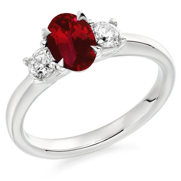 Ruby and Diamond Oval Cut Trilogy Engagement Ring