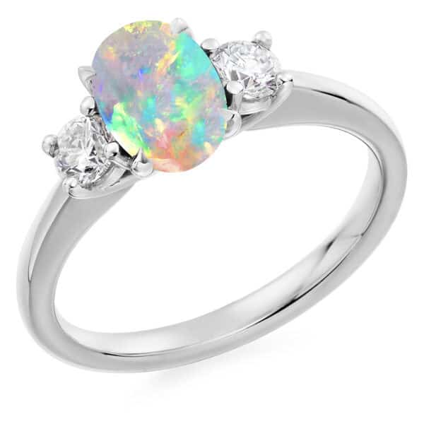 Opal and Diamond Oval Cut Trilogy Engagement Ring