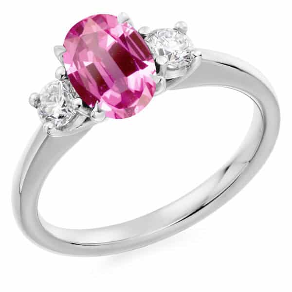 Pink Sapphire and Diamond Oval Cut Trilogy Engagement Ring