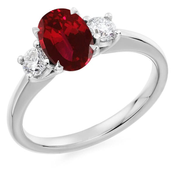 Ruby and Diamond Oval Cut Trilogy Engagement Ring