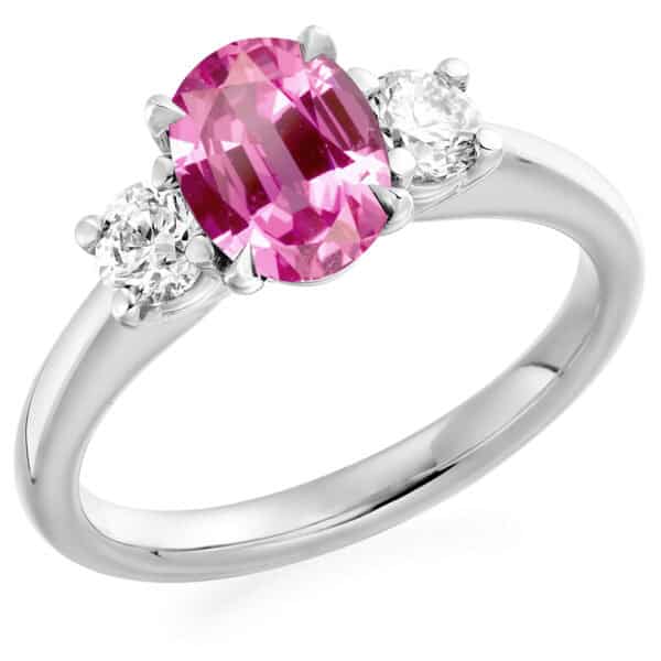 Pink Sapphire and Diamond Oval Cut Trilogy Engagement Ring