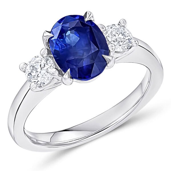 Blue Sapphire and Diamond Oval Cut Trilogy Engagement Ring
