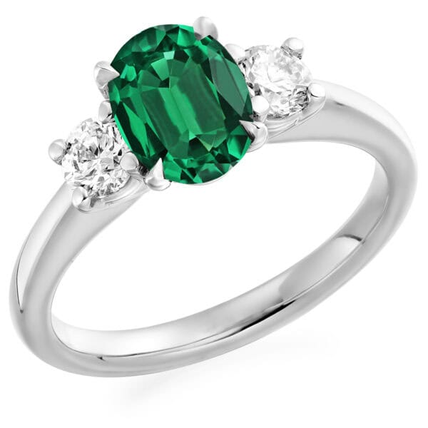 Emerald and Diamond Oval Cut Trilogy Engagement Ring