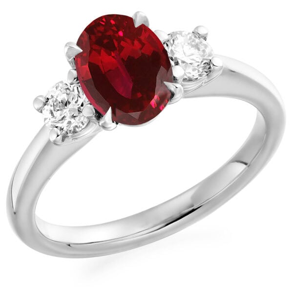 Ruby and Diamond Oval Cut Trilogy Engagement Ring