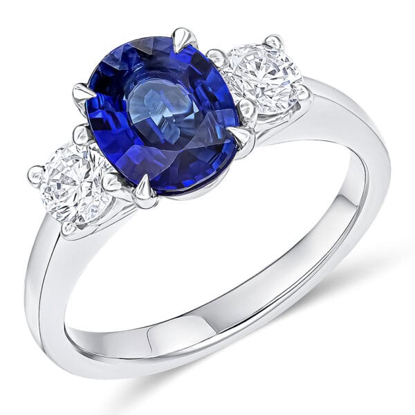 Blue Sapphire and Diamond Oval Cut Trilogy Engagement Ring