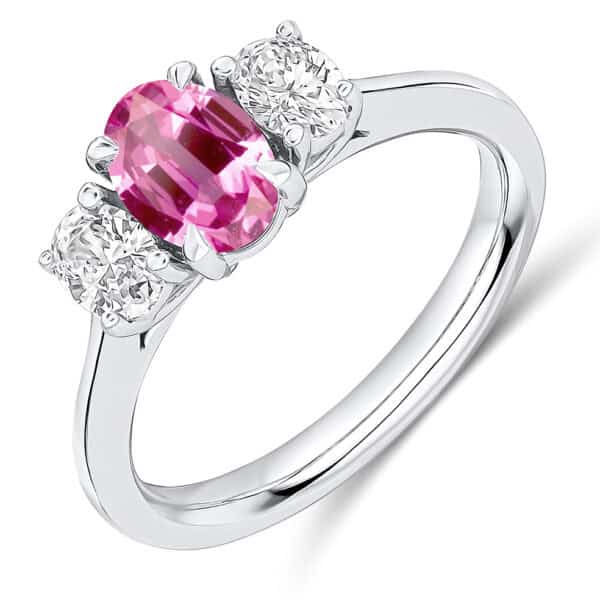 Pink Sapphire and Diamond Oval Cut Trilogy Engagement Ring
