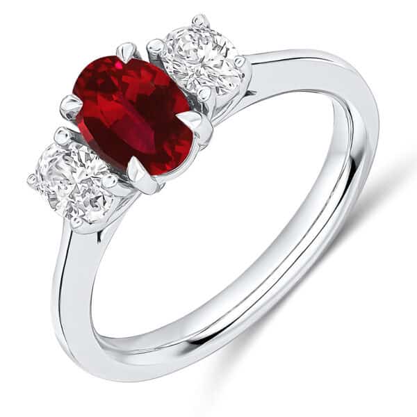 Ruby and Diamond Oval Cut Trilogy Engagement Ring