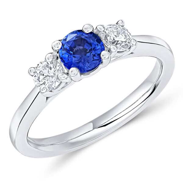 Blue Sapphire and Diamond Round Brilliant Trilogy Engagement Ring