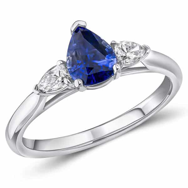 Blue Sapphire and Diamond Pear Cut Trilogy Engagement Ring